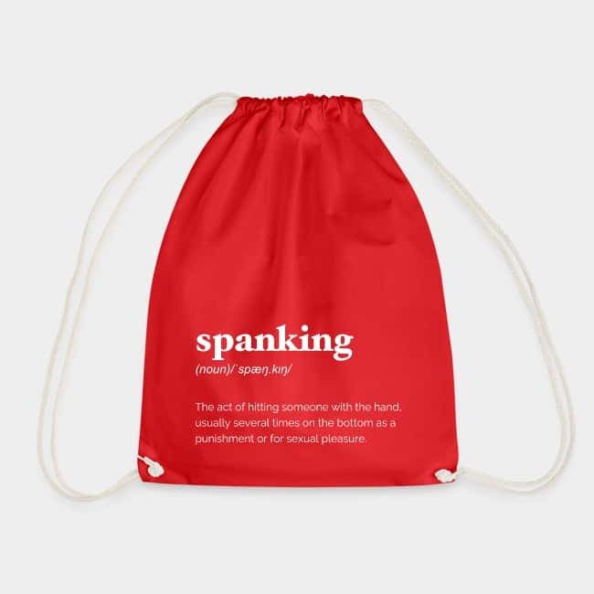 Mochila de cuerdas roja con la definición de diccionario de «spanking» en letras blancas